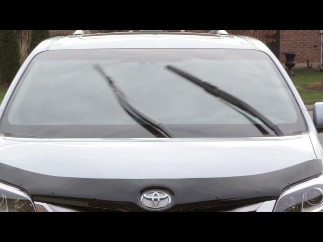 Rain-sensing windshield wipers