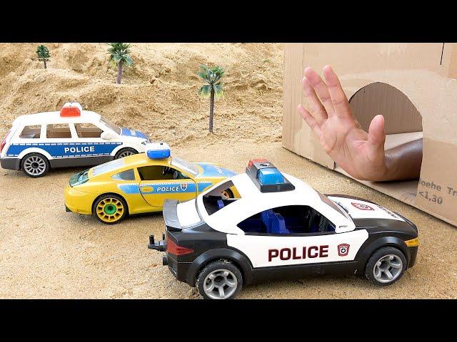 toy police car in cave gets help from fire truck | dump truck trouble in sand