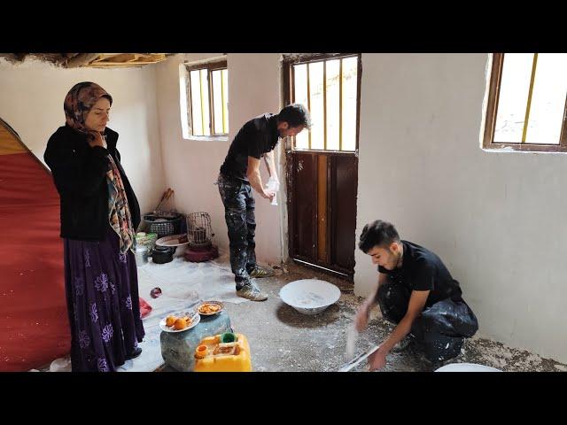 Plastering the dream house: finishing the whitewash of our cottage