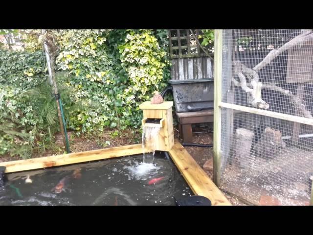 Renovated koi pond with water fall and skimmers