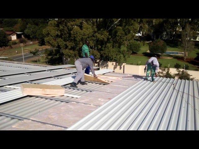 Built-up roof. Ashgrid spacer system prevents compression of insulation.