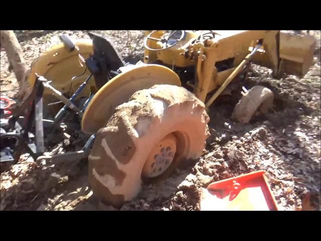 Harbor Freight 12000 winch pulling stuck tractor