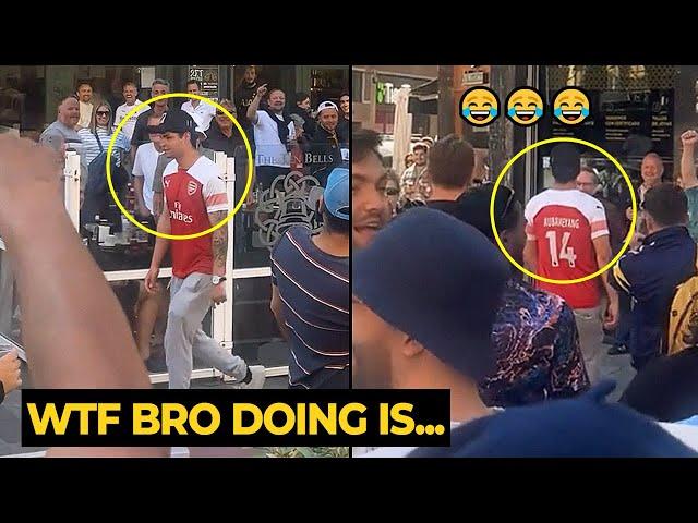 Bro with an Arsenal shirt walking through the streets of Bilbao ahead Man United vs Tottenham final