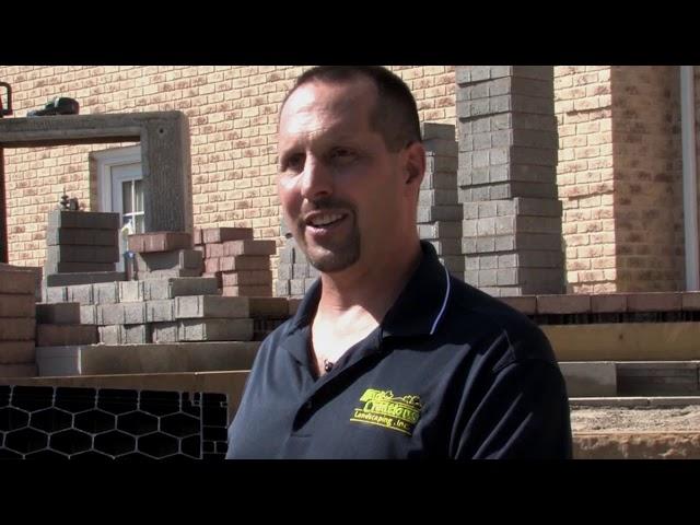 Contractor explains benefits of the SilcaGrate, used to create an elevated stone deck.