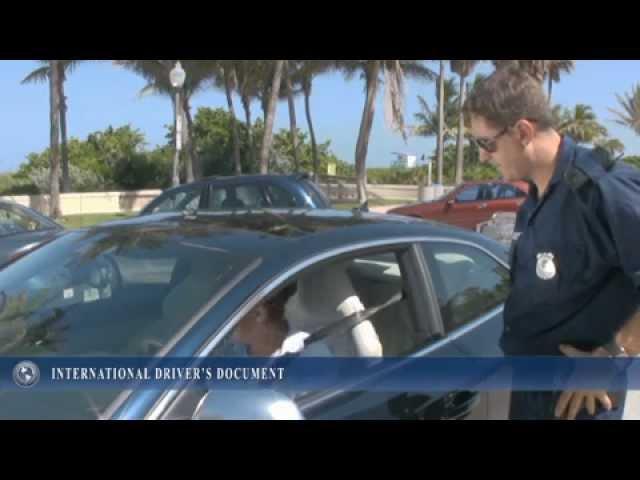 Police Officer pulls over driver with the International Driver's License.