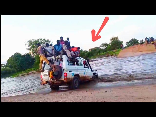 Crossing a flooded river. Not every risk is worth taking.