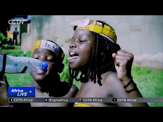 Ugandan youngsters use kitchen utensils to make music