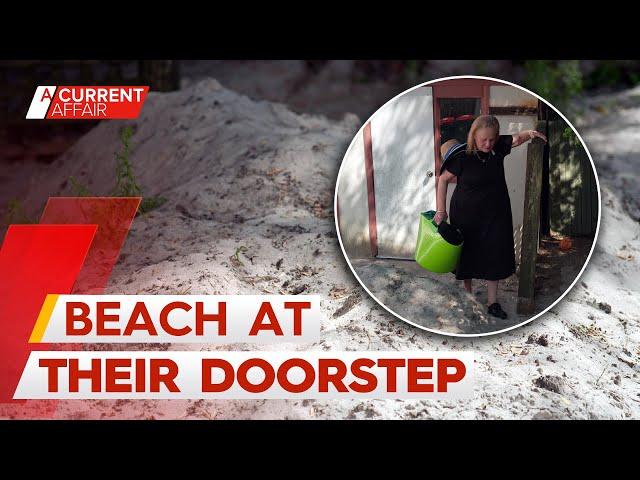 Bondi residents forced to shovel golf course sand from back of units | A Current Affair