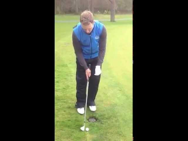 How to play golf ball lodged against the fringe of the green