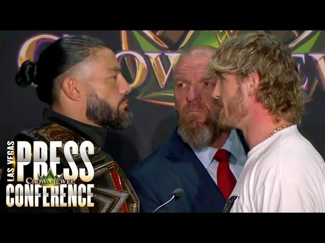 Roman Reigns shoves Logan Paul