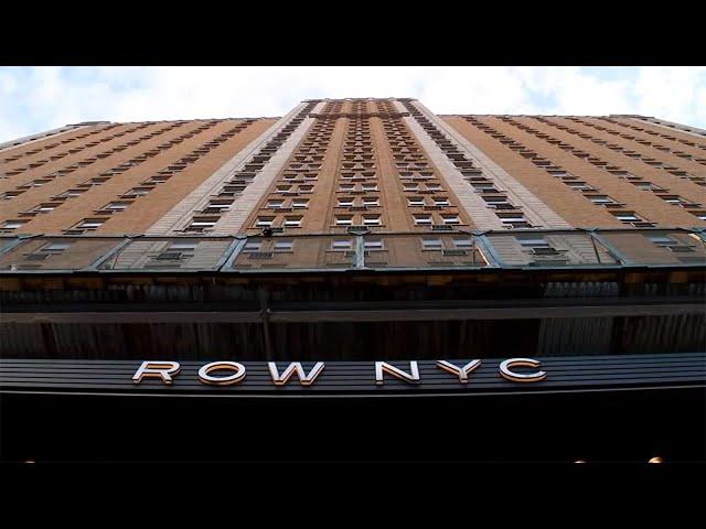 Workers at NYC hotel housing migrants concerned about safety, health