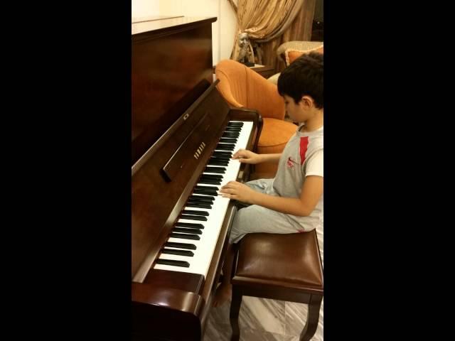 A must see 8years old  piano performance