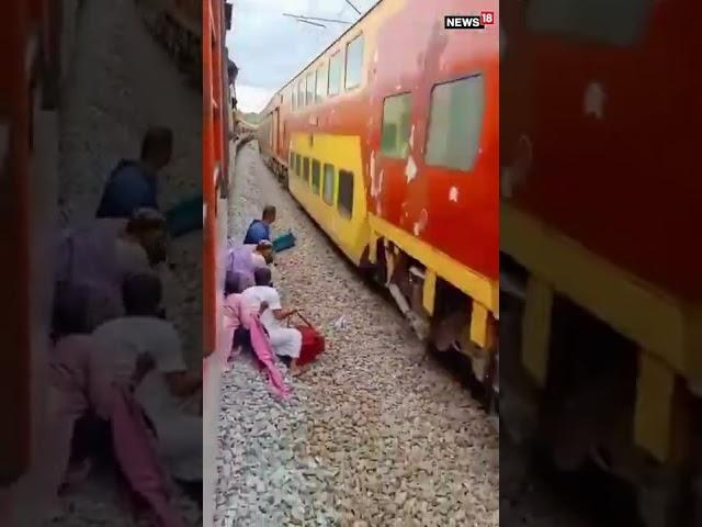 Railway Track Ruckus: Passengers Cross Seconds Before Train's Arrival | #Shorts | #ViralVideo