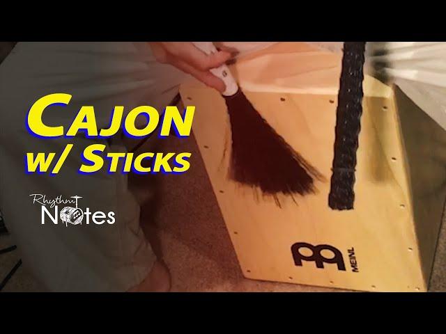 Playing Cajon With Sticks