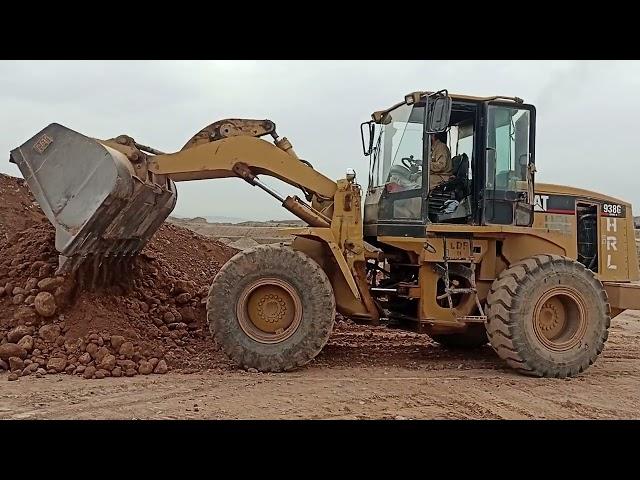 caterpillar 938G wheel Loader working hard at the crush plant. trained operator Smart Work performed