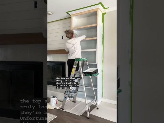 Completely custom DIY fireplace built-ins made from two affordable IKEA bookcases