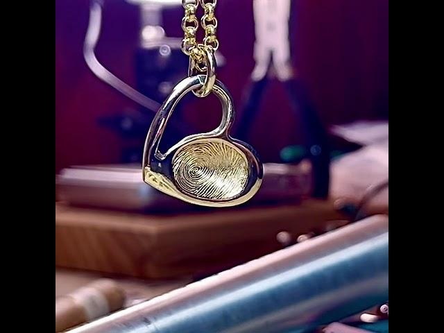 Engraved Fingerprint or thumbprint jewellery by Sophia Alexander.