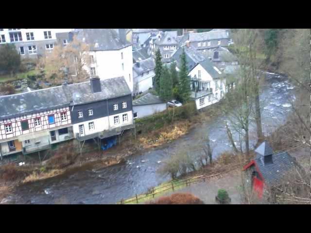 Watching the river flow through Monschau, Eifel region, Germany