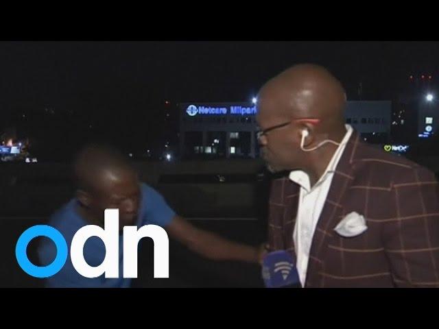 TV reporter robbed at gunpoint on camera