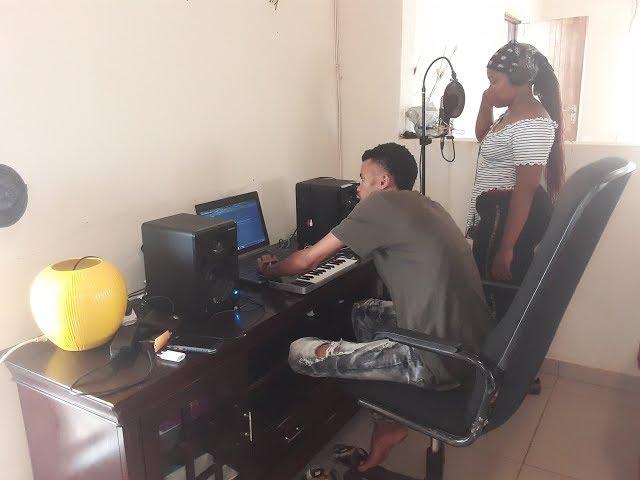 Producer Beady Boss and COLIE SA, Recording a hit song. South African Studio session