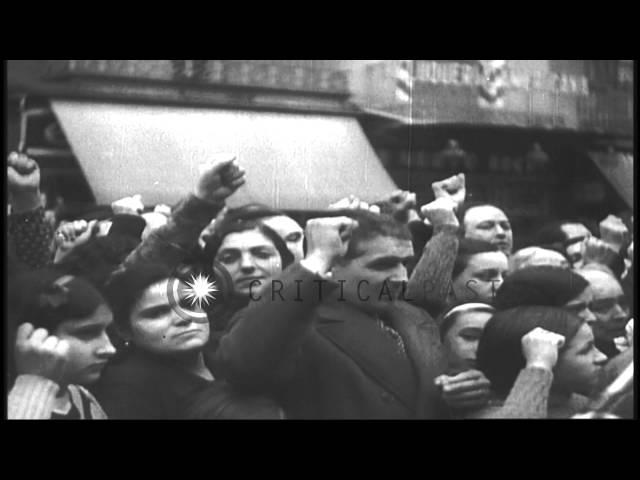 Spanish people gathered during Buenaventura Durruti's funeral procession in Barce...HD Stock Footage