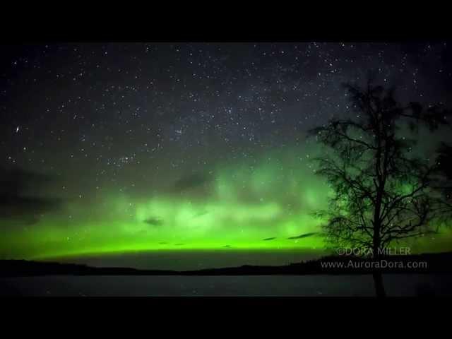 Zooming Satellites in the Aurora Sky