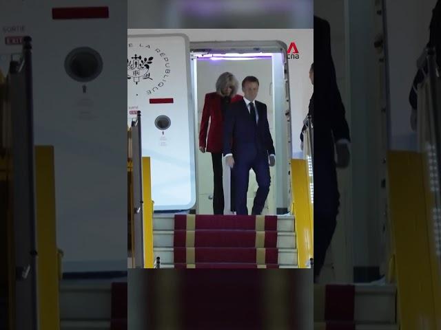 French President Emmanuel Macron apparently shoved in face by wife