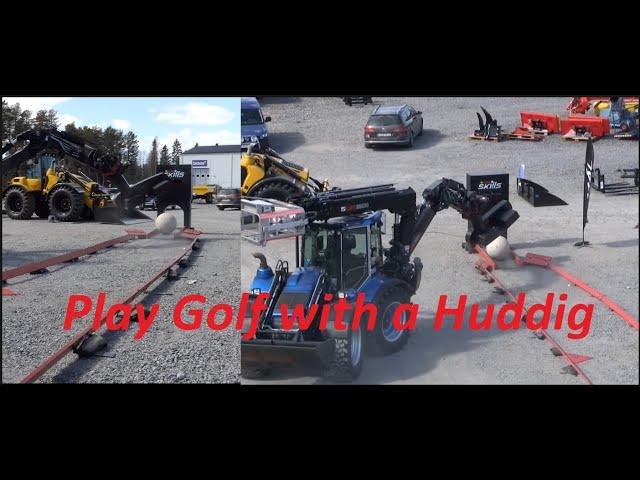 Play Golf with a Huddig Backhoe loader and Tiltrotator