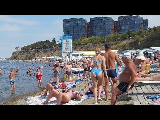 Russia, the Black Sea. The beach is pebbly in the bay. There are a lot of vacationers. No comments