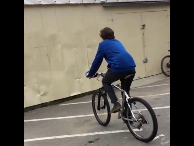 Dumb ass rides bike into wall