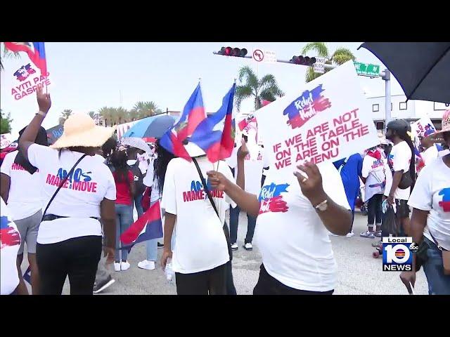 Protestors march in North Miami against the humanitarian crisis in Haiti