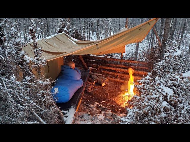 Winter Camping in Snow Storm with Survival Shelter & Bushcraft Cot.