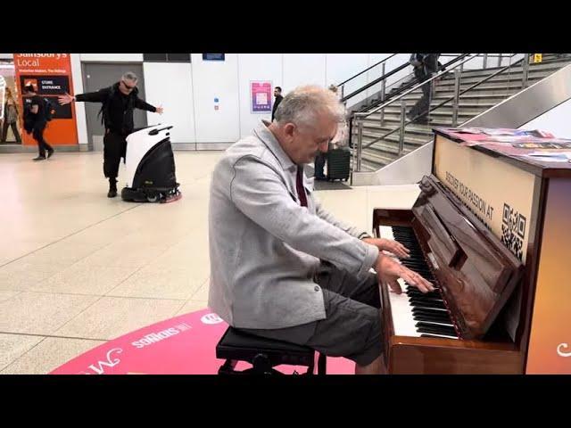 CCP Spy Robot Monitoring A London Public Piano