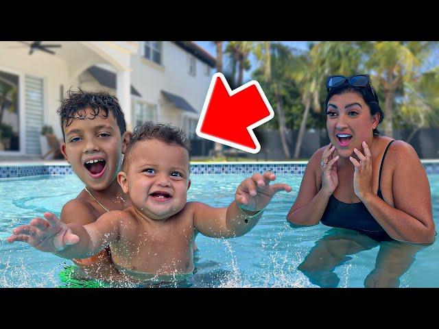 Orly Teaches Baby Roman How To Swim