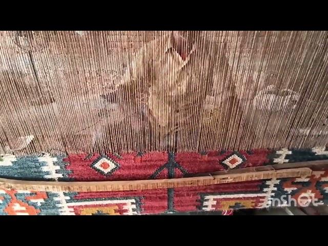 Handicraftsman craftsman worker working rugs workshop manufacture manual labor using hands weaving