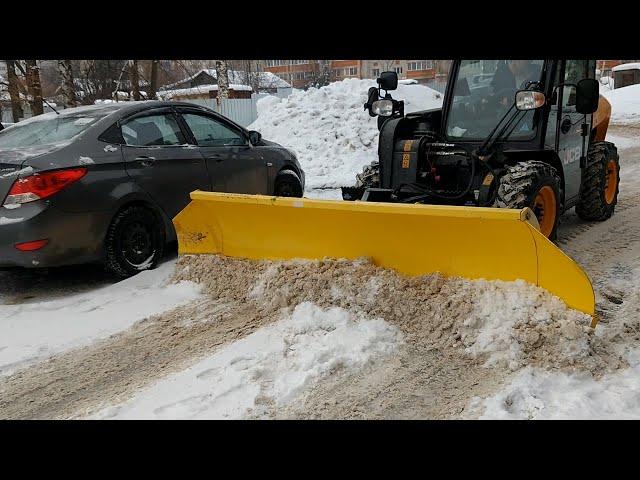 JCB telescopic loader with snow blade