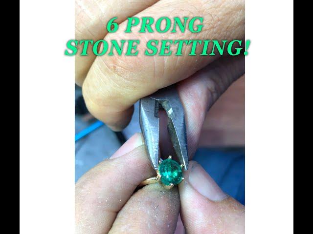 Hand setting a 6 prong solitaire Colombian emerald gold ring