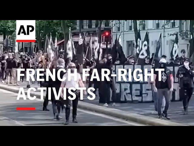 French far-right activists march through streets of Paris