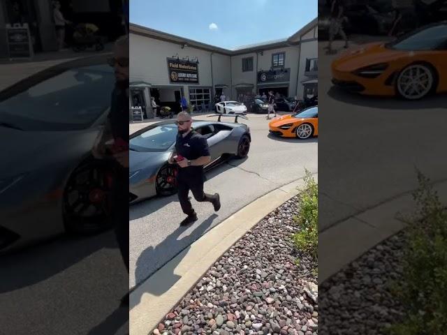 McLaren 720s with ryft titanium exhaust and Lamborghini Huracan Performonte driving by car show