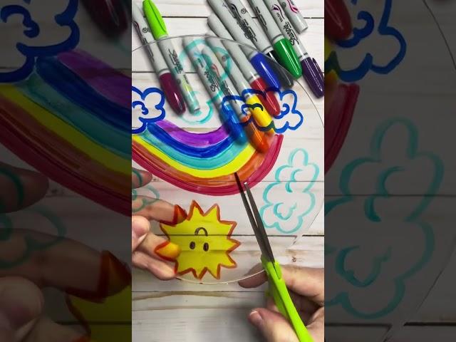 Easy Rainbow Suncatcher Craft with Recycled Plastic Container. Teach kids about light and weather.