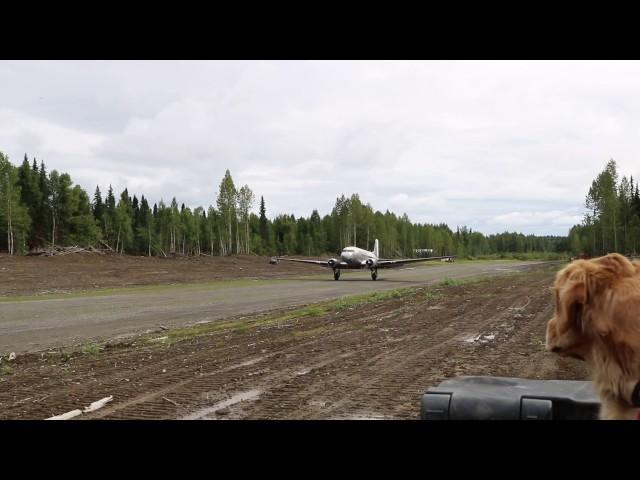 DC-3 landing at pvt gold mine near Skwentna, AK