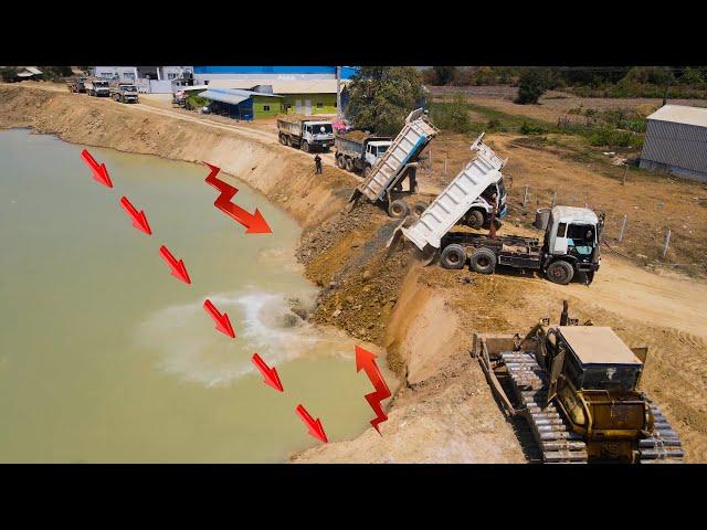 Excel Bulldozer And Dumper Truck at Work Project Road Widening Construction On Canal