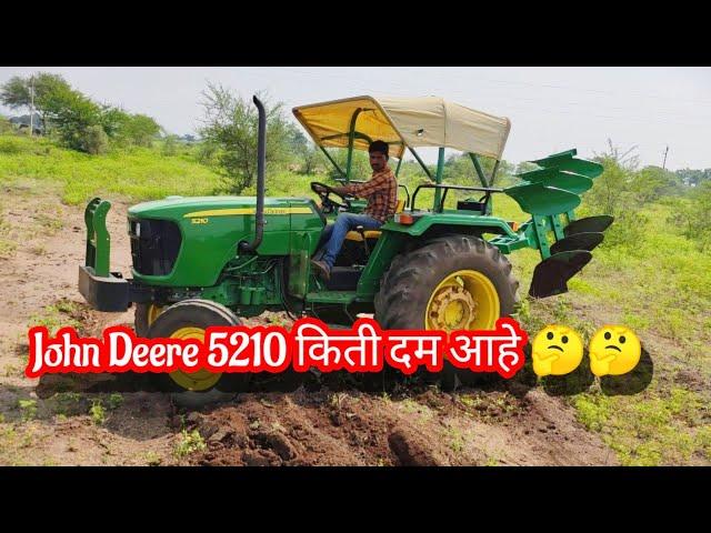 John Deere 5210 with 3 bottom reversible plough