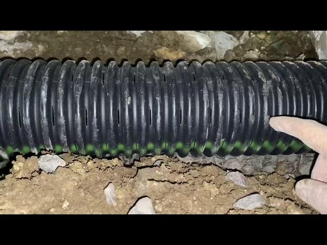 DIY French Drain:  Why You Need Gravel Around a Perforated Pipe