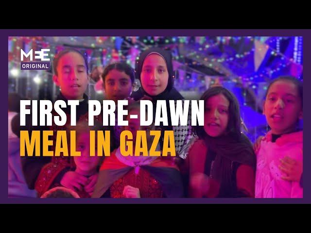 Palestinians in Gaza gathered for their first Ramadan pre-dawn meal