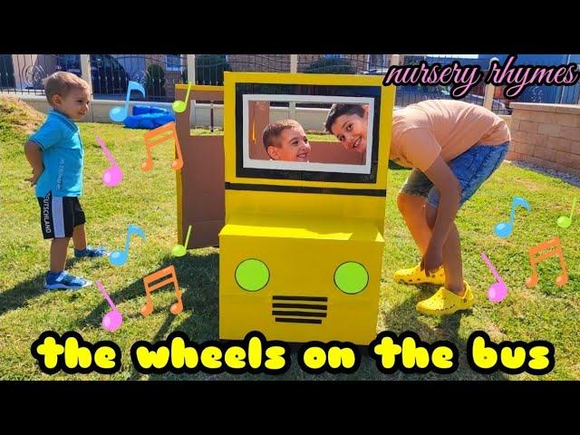 the wheels on the bus kids song nursery rhymes with Danyel Deniz Edis yellow school bus Kinderlieder