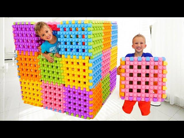 Vlad and Niki playing with Toy Blocks