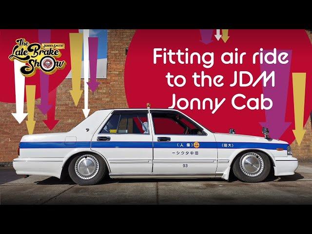 JDM Nissan Tokyo Taxi fitted with Air Lift air bag suspension - in detail