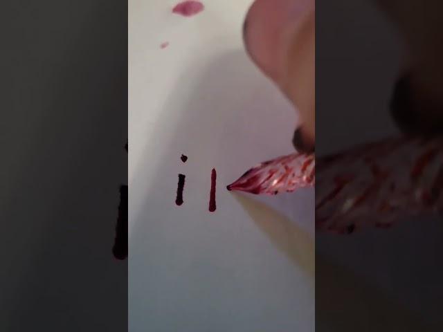 writing I love you in ink that looks like deep red blood