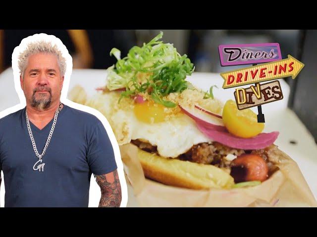 Guy Fieri Comes Back for "Next-Level" Filipino Hot Dog | Diners, Drive-Ins and Dives | Food Network